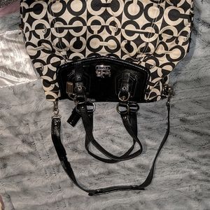 Well loved Authentic Coach purse.